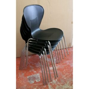 Black Canteen chairs with chrome legs stacked